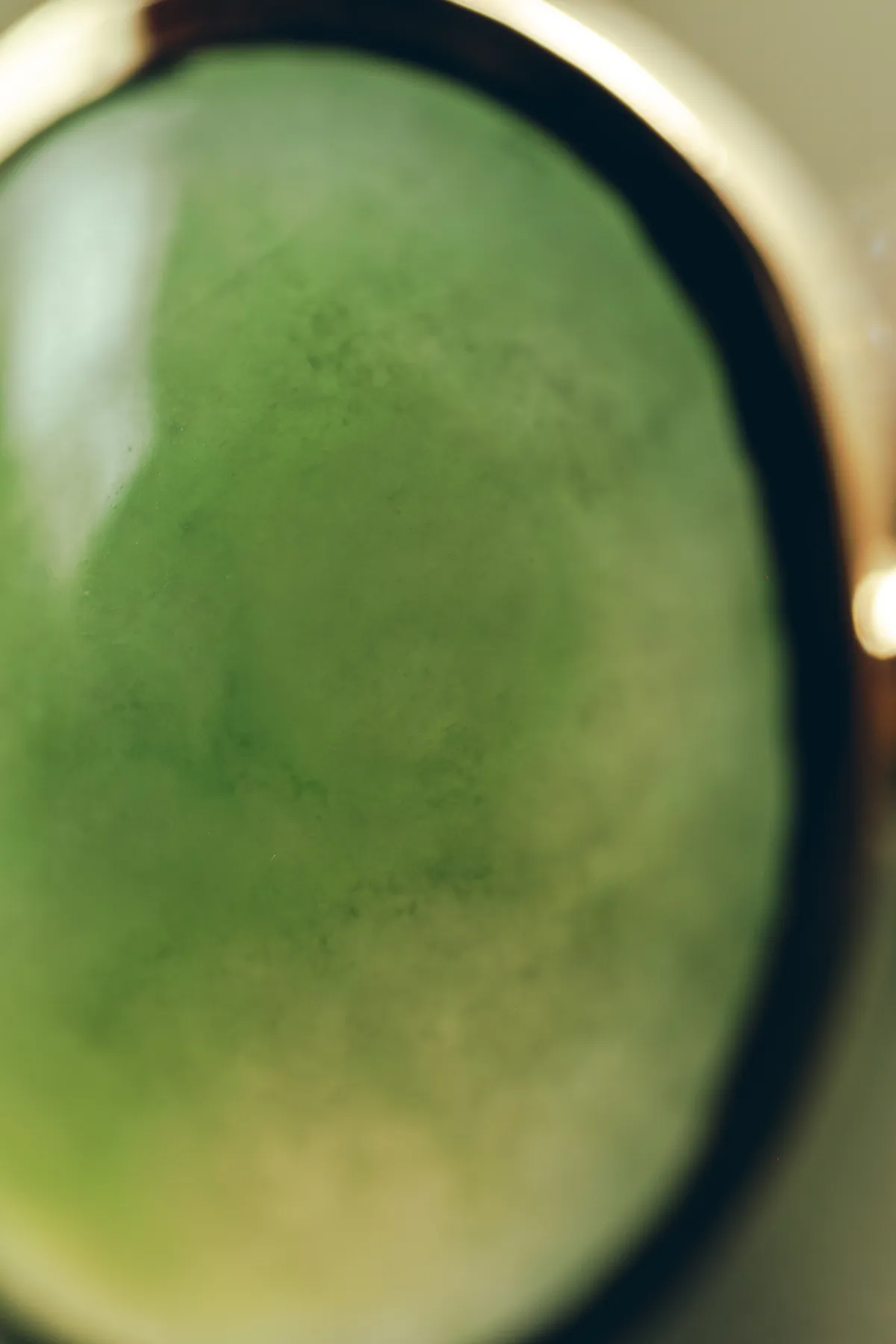 Green jadeite cabochon