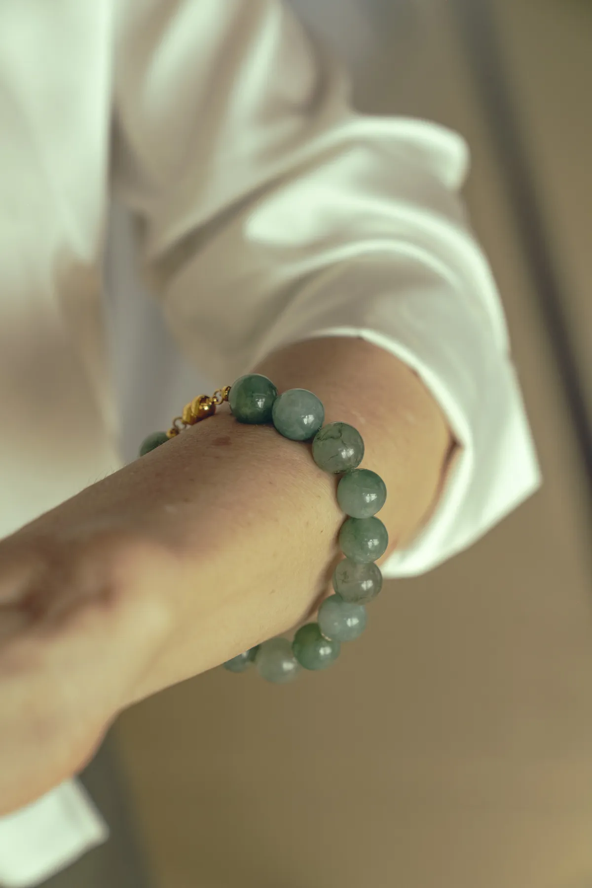 Jade beads — worn